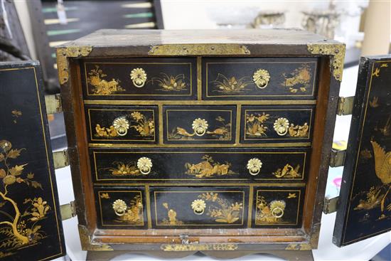 An early 18th century japanned table cabinet, H. 16in., W. 17.5in, later apron stand